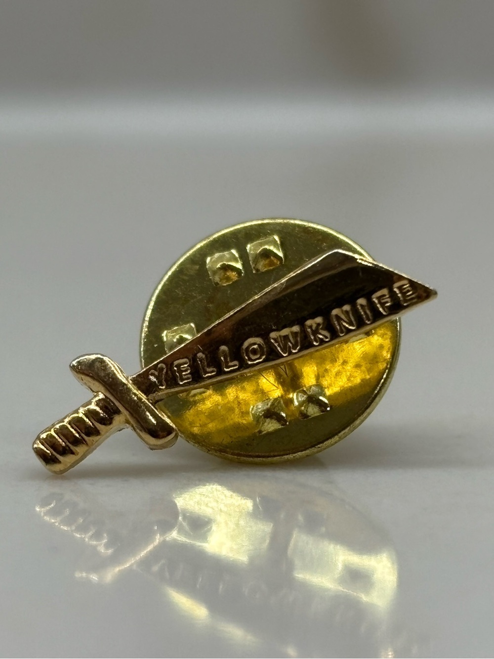 Vintage Yellowknife Gold Toned Knife Sword Shaped Lapel Pin Souvenir